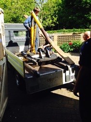 The arrival of the main frame on a low loader truck